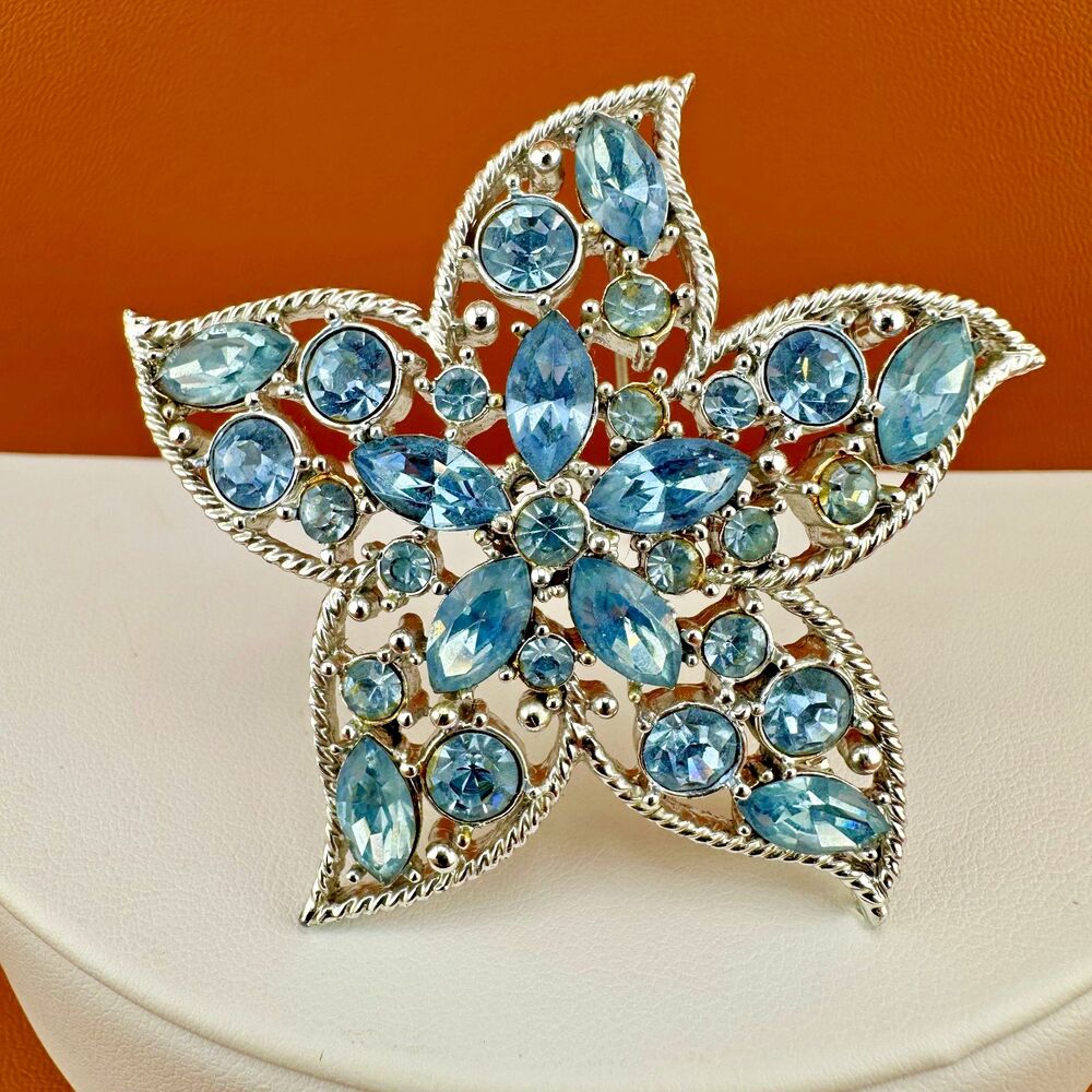 Vintage Blue Rhinestone Brooch Silver Tone Sarah Coventry Star Fire Flower